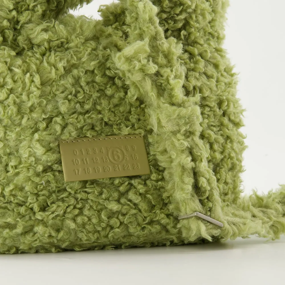 Green shoulder bag with wool effect